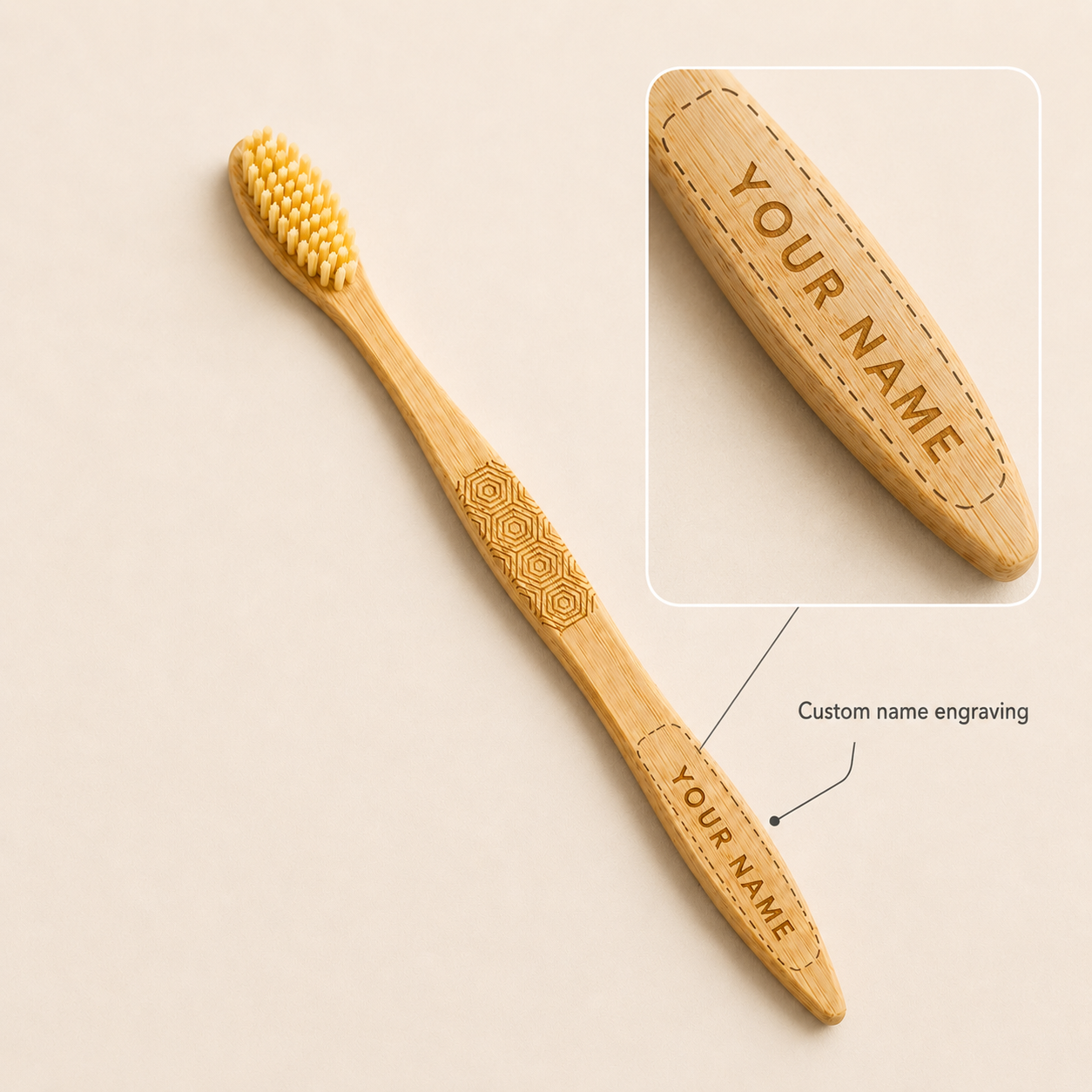 Bamboo fibre toothbrush with a close-up preview of custom name engraving on the handle